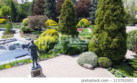 Amazing drone point of view on Wroclaw Botanical garden with flowerbeds and garden pathes Amazing drone point of view on Wroclaw Botanical garden with flowerbeds and garden pathes 113702001