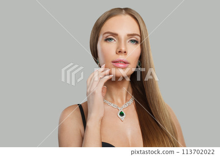 Gorgeous jewelry model beautiful woman portrait. Brunette woman with long smooth hair and necklace 113702022