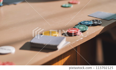 Young guys playing poker at a table. Young guys playing poker at a table. 113702125