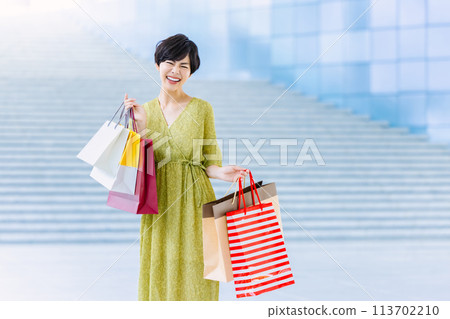 Woman shopping at a shopping center 113702210