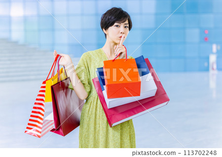 Woman shopping at a shopping center 113702248