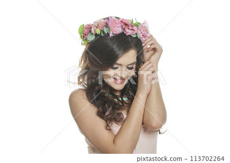 Isolated fashion brunette model with make-up, fresh clear skin, shiny long wavy hairstyle Isolated fashion brunette model with make-up, fresh clear skin, shiny long wavy hairstyle 113702264
