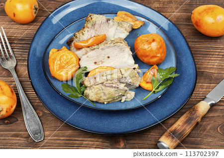 Baked pork meat with medlar or loquat. 113702397