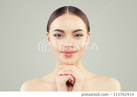 Perfect fashion model face close up. Medicine, facial treatment, massage and plastic surgery concept Perfect fashion model face close up. Medicine, facial treatment, massage and plastic surgery concept 113702414