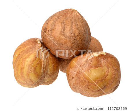 Three hazelnuts on isolated background 113702569