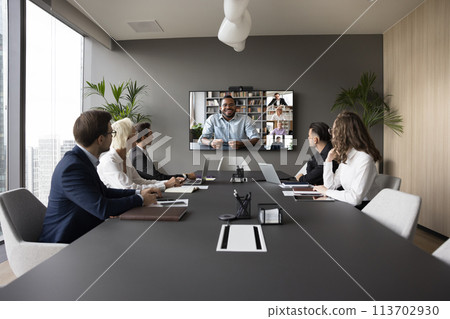 Businesspeople take part in virtual meeting with international partners Businesspeople take part in virtual meeting with international partners 113702930