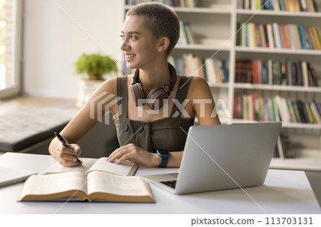 Attractive female student deep in thoughts about successful university admission 113703131