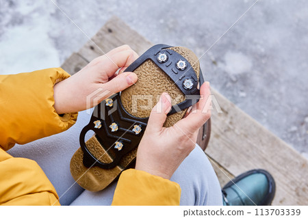 Attaching rubber pad with spikes to sole of shoe will prevent slipping during icy conditions. 113703339