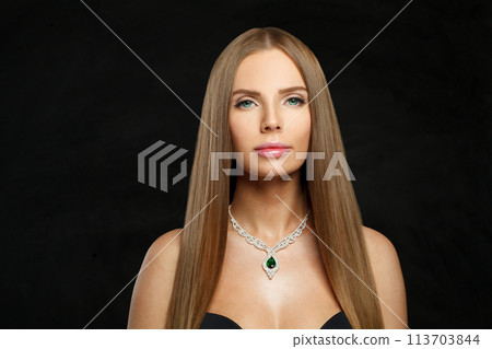 Nice jewelry model beautiful woman portrait. Brunette woman with long smooth hair and necklace Nice jewelry model beautiful woman portrait. Brunette woman with long smooth hair and necklace 113703844