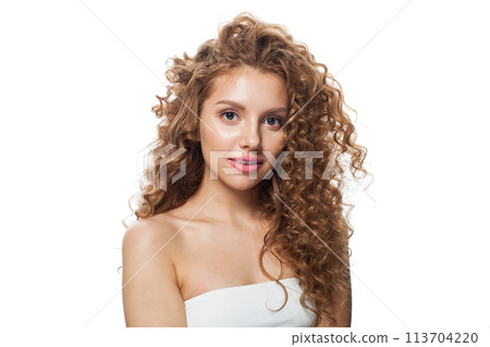 Cute woman face. Young model with healthy skin, long hair and makeup on white background 113704220