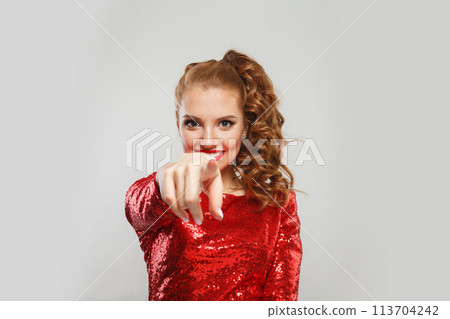 Perfect fashion model woman pointing at camera on white background. Beautiful lady 113704242