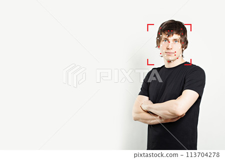 Facial recognition. Young man and technology biometric security system 113704278