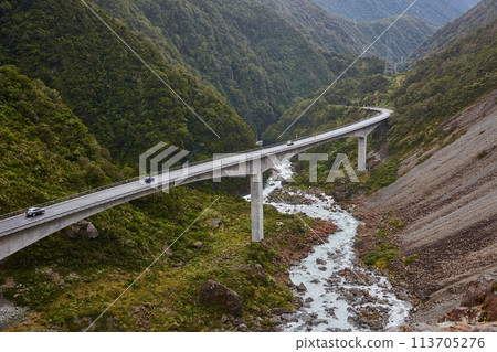 Arthur's Pass in New Zealand, bridge over mountain river Arthur's Pass in New Zealand, bridge over mountain river 113705276