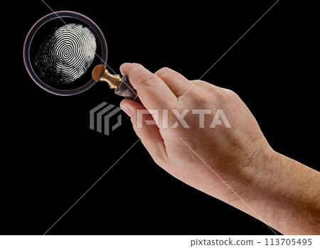 Male Hand Holding Magnifying Glass Viewing A Fingerprint on a Black Background. Male Hand Holding Magnifying Glass Viewing A Fingerprint on a Black Background. 113705495