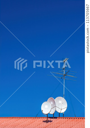 Four antennas on the roof of a house, parabolic satellite dishes, long-wave, medium-frequency radio communication. The problem of receiving a television signal and the Internet in remote areas. Four antennas on the roof of a house, parabolic satellite dishes, long-wave, medium-frequency radio communication. The problem of receiving a television signal and the Internet in remote areas. 113705667