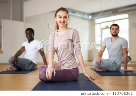 People exercising lotus asana in gym 113708361