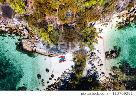 Aerial view of island and clear water Aerial view of island and clear water 113709291