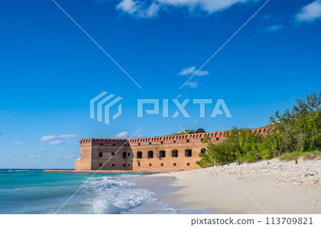 Waves and beach surf outside Fort Jefferson on Dry Tortugas National Park. 113709821