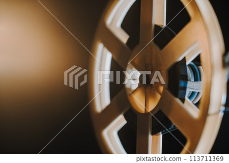Obsolete film projector, retro home theatre entertainment. Nostalgia, memories Obsolete film projector, retro home theatre entertainment. Nostalgia, memories 113711369