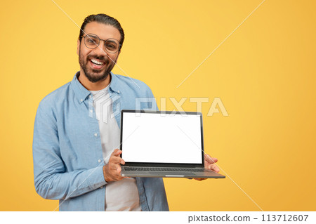 Man with laptop showing blank screen Man with laptop showing blank screen 113712607