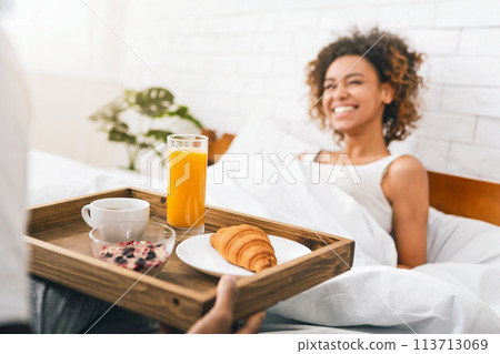 Boyfriend bring some breakfast to his girlfriend in bed Boyfriend bring some breakfast to his girlfriend in bed 113713069
