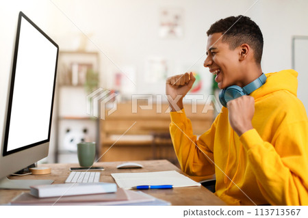 Individual in a hoodie analyzing with magnifying glass Individual in a hoodie analyzing with magnifying glass 113713567