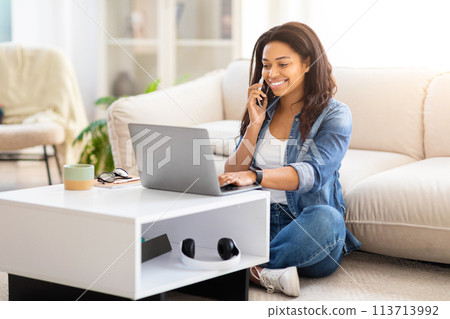 Happy african american woman talking on the phone 113713992