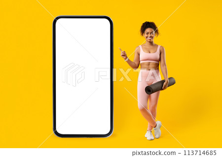 Fit african american woman with phone screen mockup Fit african american woman with phone screen mockup 113714685