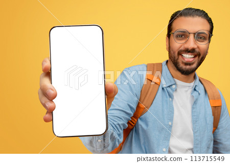 Man showing smartphone to camera Man showing smartphone to camera 113715549