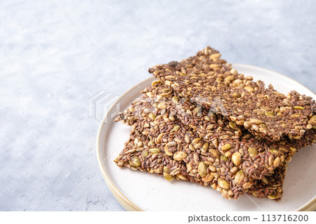 Seed crackers on neutral background Seed crackers on neutral background 113716200