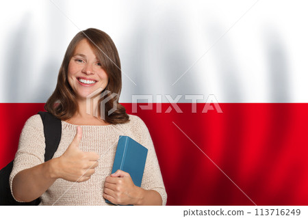 Happy woman student against Polish flag background. Travel, education and learn language 113716249