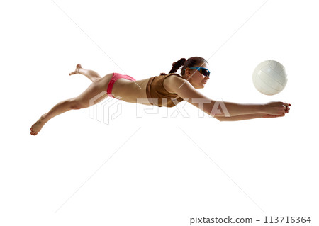Competitive woman, skilled volleyball player in action focused on ball to serve perfect pass against white background. Competitive woman, skilled volleyball player in action focused on ball to serve perfect pass against white background. 113716364