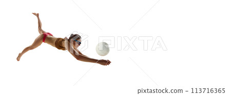 Banner. Young athlete woman, beach volleyball player passes ball in motion against white background. Negative space. Banner. Young athlete woman, beach volleyball player passes ball in motion against white background. Negative space. 113716365