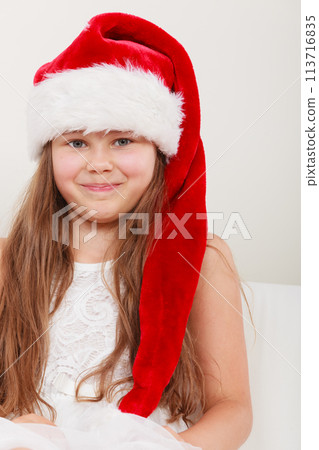 Happy little girl kid in santa hat. Christmas. Happy little girl kid in santa hat. Christmas. 113716835