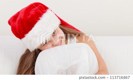 Little girl kid in santa claus hat. Christmas. 113716867