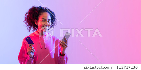 Woman presenting passport and smartphone Woman presenting passport and smartphone 113717136