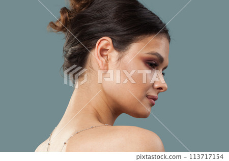 Pretty woman portrait on blue background Pretty woman portrait on blue background 113717154