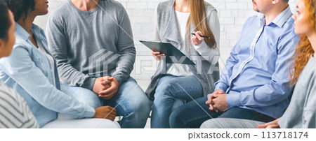 Psychologist talking to addicted people in office Psychologist talking to addicted people in office 113718174