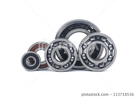 Bearings of varying sizes and types isolated on white Bearings of varying sizes and types isolated on white 113718516