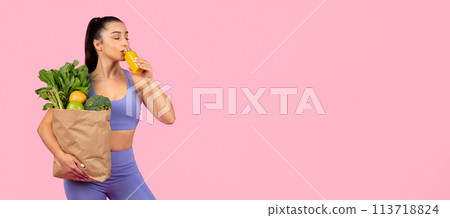 Woman drinking orange juice with groceries Woman drinking orange juice with groceries 113718824