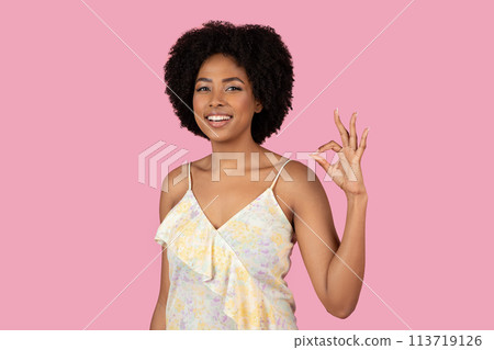 African American woman making OK sign with fingers African American woman making OK sign with fingers 113719126