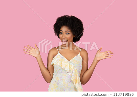 Woman with arms open in surprise on pink Woman with arms open in surprise on pink 113719886