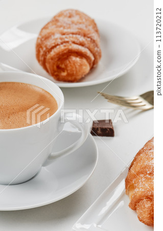 coffee and xuixos typical of catalonia, spain 113720212