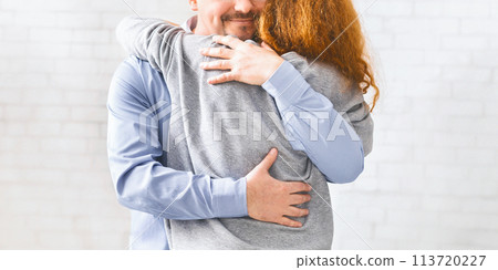 Positive people hugging during group rehab therapy Positive people hugging during group rehab therapy 113720227