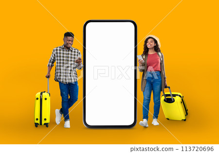 Smiling couple with suitcase next to phone mockup Smiling couple with suitcase next to phone mockup 113720696