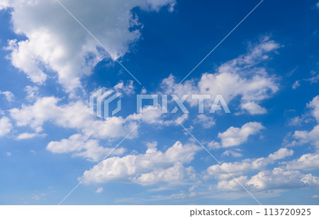 Blue sky nature background with fluffy white clouds 113720925
