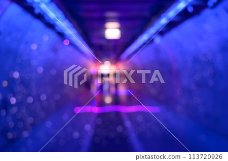 Blur abstract corridor tunnel with colorful bokeh lights background. 113720926