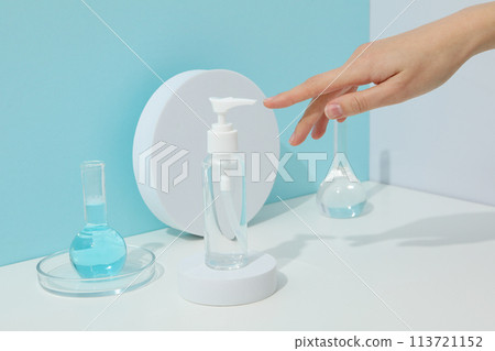 Cosmetics with chemical test tubes on a blue background 113721152