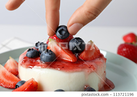 Panna cotta dessert, on the table, close-up. Panna cotta dessert, on the table, close-up. 113721196