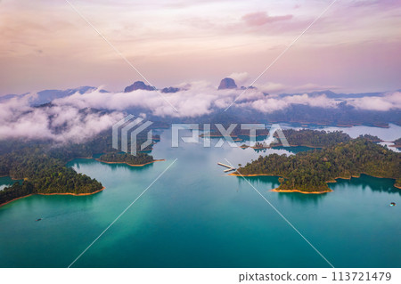 Aerial view of Khao Sok national park at sunrise, in Cheow lan lake, Surat Thani, Thailand Aerial view of Khao Sok national park at sunrise, in Cheow lan lake, Surat Thani, Thailand 113721479